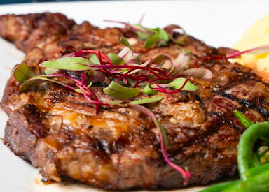 Stoked Restaurant signature dishes Tuna Poke Nachos
Blackberry BBQ Chicken
Angus Ribeye